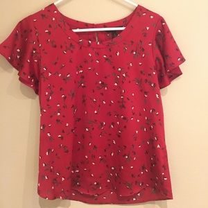 Red floral blouse
